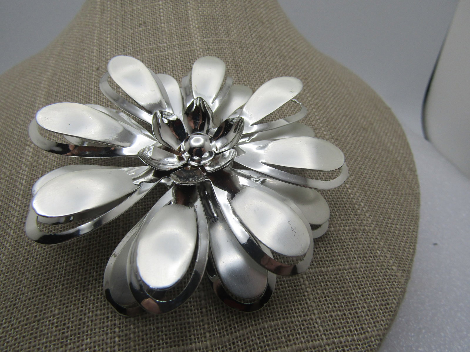 Vintage Large Floral Blossom Brooch, 1960's, 3": Vintage Large Floral Blossom Brooch, 1960's, 3". Tiered satiny and smooth and shiny finish with center of the center raised and a cutout outline that is shiny and smooth and outlines, set lower, the b
