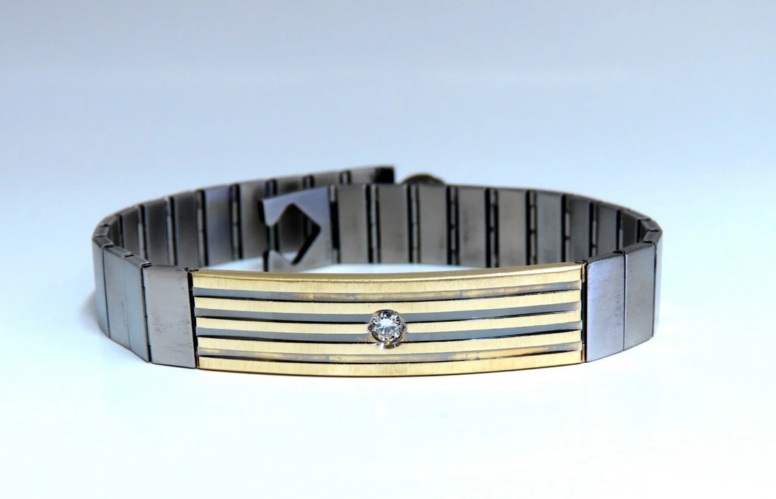 1980's Retro Mod 18kt Stainless Steel Diamond Bracelet**: Title: 1980's Retro Mod 18kt Stainless Steel Diamond Bracelet** Description: .10ct. Natural diamond Retro ID bracelet. Round, full cut. H color Vs-2 clarity. 18kt. yellow gold & Stainless Steel 26.1 G