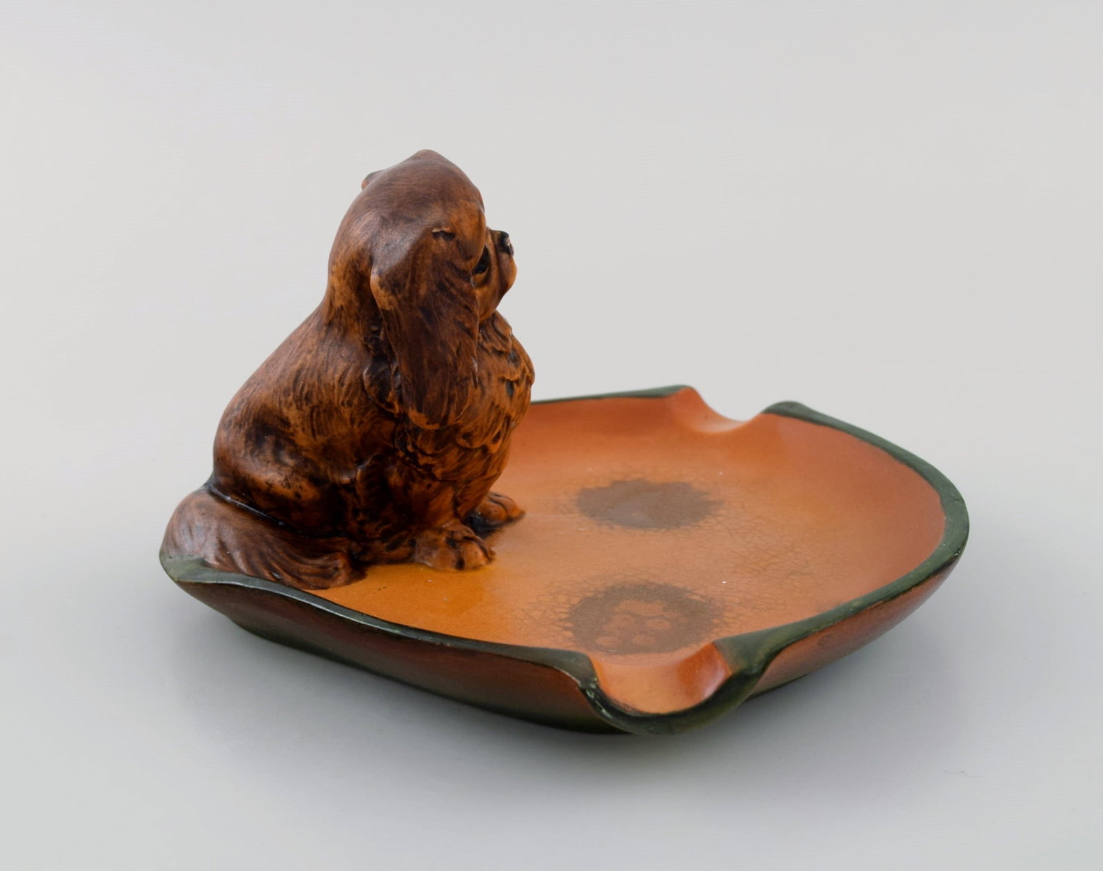 Ipsen's, Denmark. Bowl in hand-painted glazed ceramics modeled with Pekingese. 1920s / 30s. Model - 4