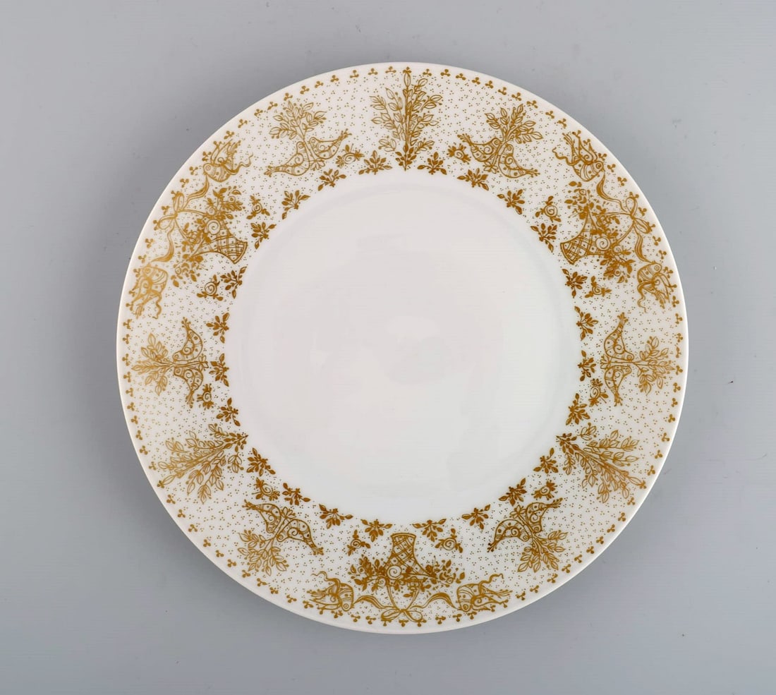 Bjørn Wiinblad for Rosenthal. 10 plates in porcelain with gold decoration. 1980s. - 2