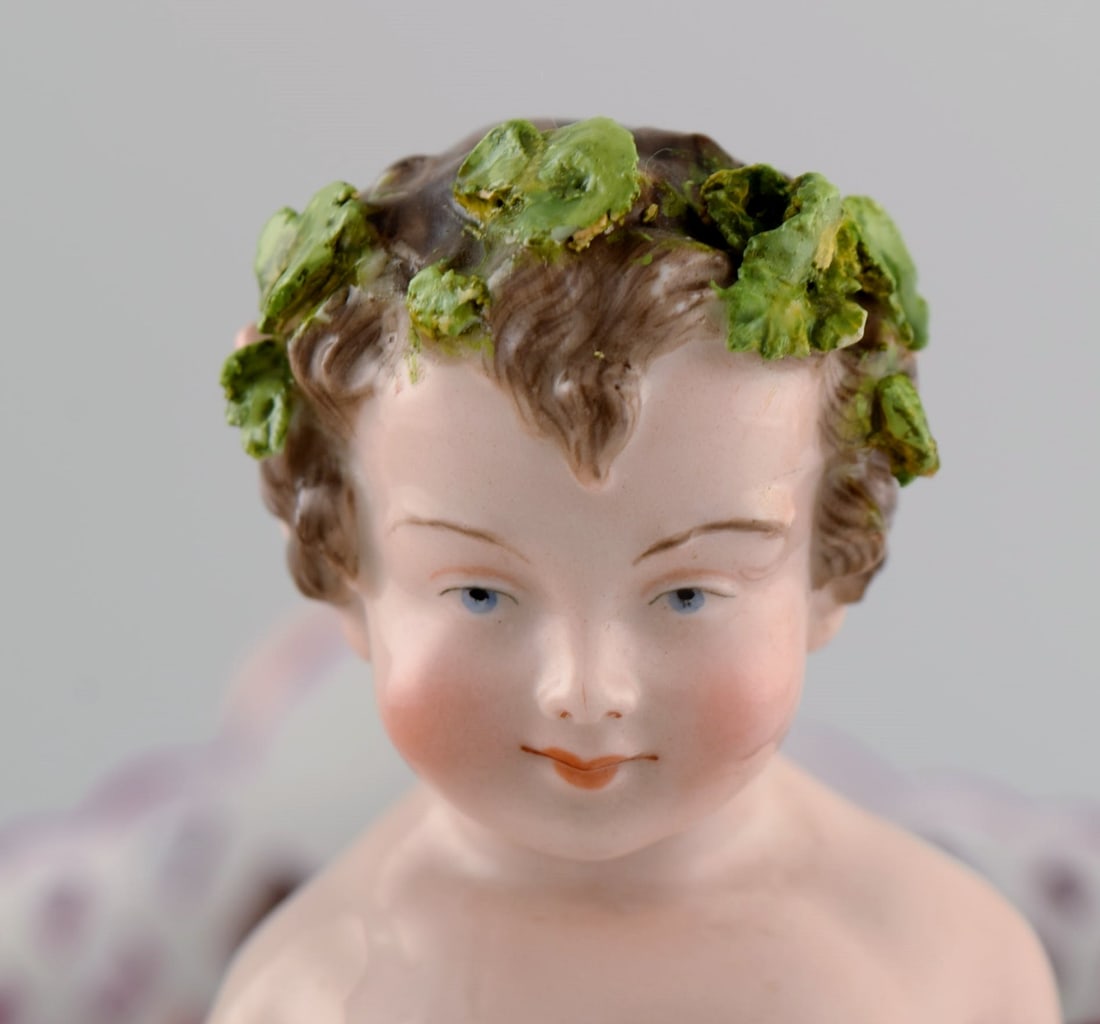Large antique Meissen centrepiece in openwork hand-painted porcelain decorated with fauns. Approx. - 7