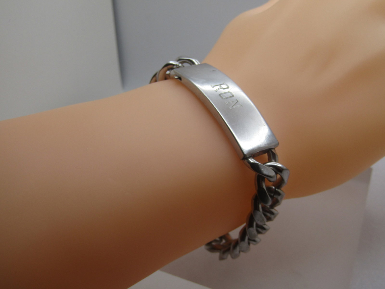 Vintage Speidel RON I.D. Bracelet, 8", Cuban Link, 1970's: Vintage Speidel RON I.D. Bracelet, 8", Cuban Link, 1970's. It is appx. 1/2" wide. Silver p lated with some wear on the finish on the back side of the bracelet. Signed Speidel and engraved on the back