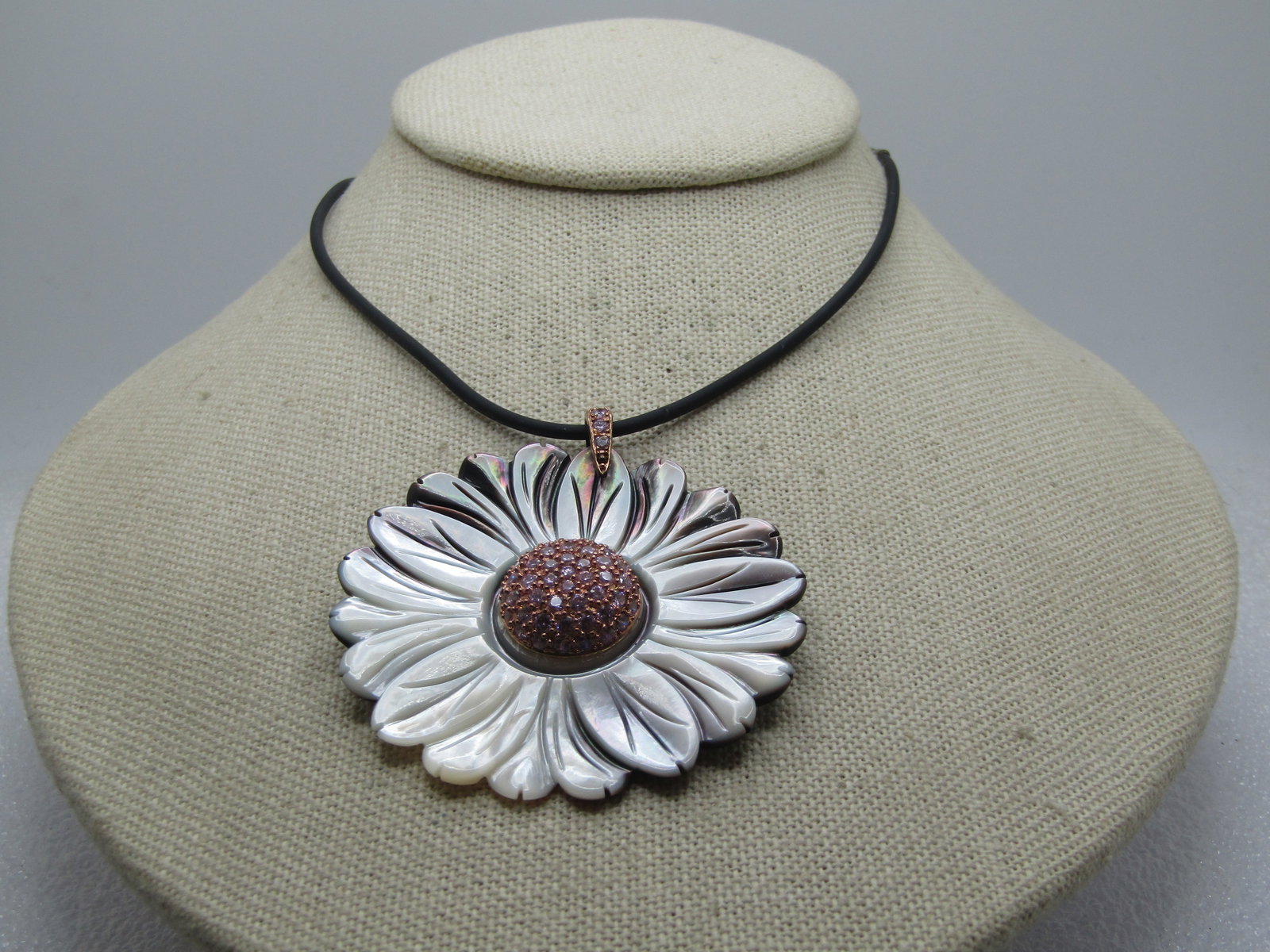 Vintage Carved Floral MOP Necklace, 18", Sterling Clasp, 1980's-1990's: Vintage Carved Floral MOP Necklace, 18", Sterling Clasp, 1980's-1990's. The pendant has a rose gold bail and raised center, both with pink CZ's set throughout the bail and center of the blossom. The b