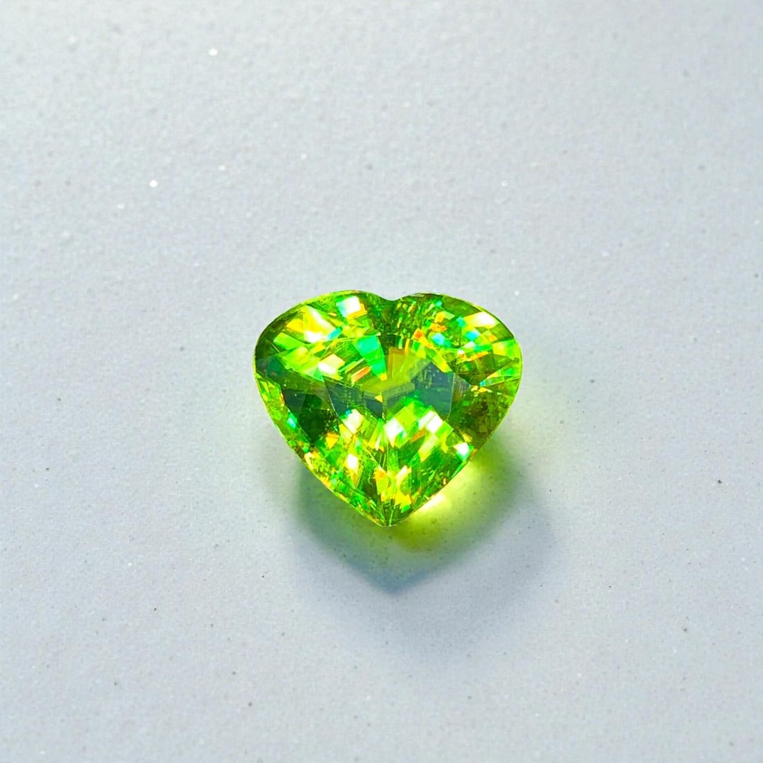 Full Fire Sphene Titantite Gemstone, Green Sphene Ring Stone For Jewelry: Full Fire Sphene Titantite Gemstone, Green Sphene Ring Stone For Jewelry Weight (CT) : 5.05 Measurements(MM) : 11.5 x 10.3 x 6 Shape : Heart Pear Color : Green Origin : Madagascar Reserve: $1,100.00 S