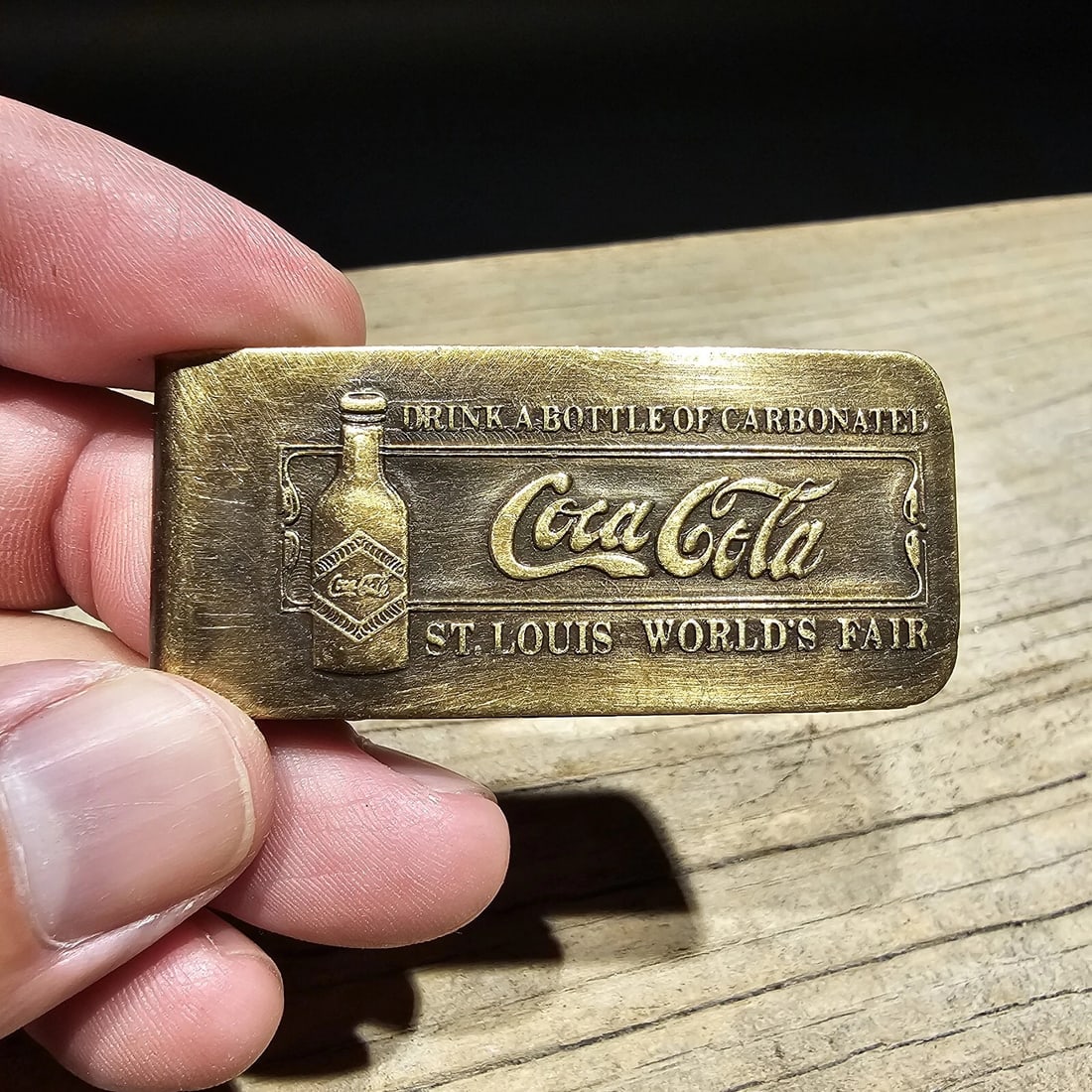 Brass Coca Cola Money Clip: This all solid brass replica money clip will surely make you wonder its age! It is made to look just like the antique The face of this plate has a very pleasing brown patina with slight traces of orig