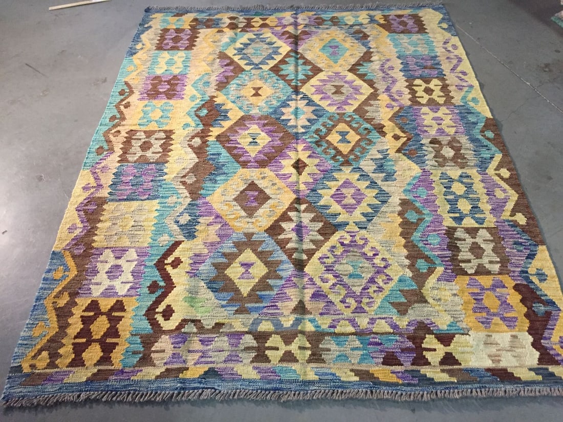 COLORFUL HAND KNOTTED KLIM 5x6.5: Title:COLORFUL HAND KNOTTED KLIM 5x6.5 Description:5'.0"X 6'.5" Colorful 100% wool reversible Klim rug in multi pastel colors Hand Knotted in Pakistan Reserve: $175.00 Shipping: Domestic: Flat-rate of