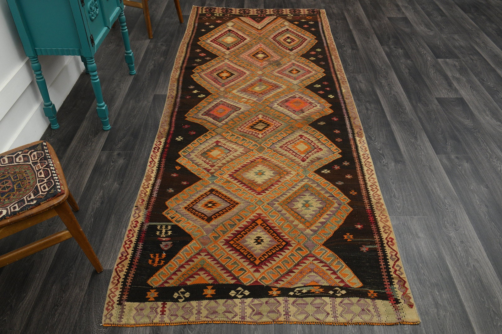 4.3x11.3 ft, TURKISH WIDE KILIM Runner: Title: 4.3x11.3 ft, TURKISH WIDE KILIM Runner Description: This Turkish one-of-a-kind Vintage Flatweave Kilim Rug is hand-knotted and handwoven by the most skilled artisans who use pure wool, in vibra