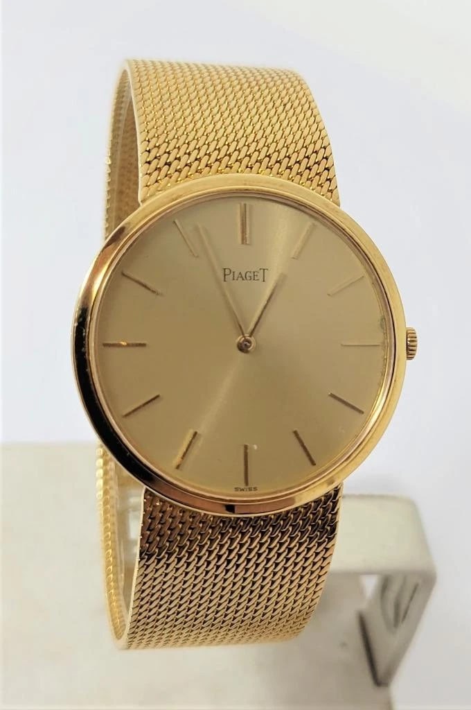 Unisex PIAGET ALTIPLANO 18k Yellow Gold Winding Watch Mesh Bracelet Ref 900319: This Mens PAIGET watch is Swiss made. Great present for yourself or someone you love as well as for collectors or enthusiasts! * Solid 18k yellow gold case, back & bracelet * Back cover is marked; 900