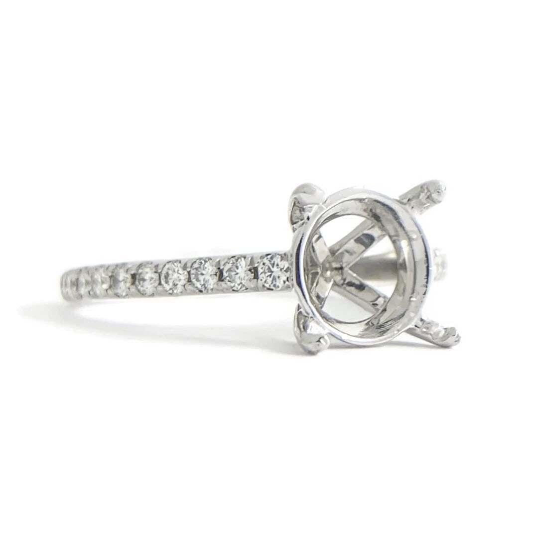 Thin Diamond Engagement Ring 4-Prong Setting Mounting 14K White Gold .30 CTW: Thin Diamond Engagement Ring 4-Prong Setting Mounting 14K White Gold .30 CTW This is a gorgeous diamond engagement ring mounting ready to house a diamond or gemstone of your choice. Please let us know