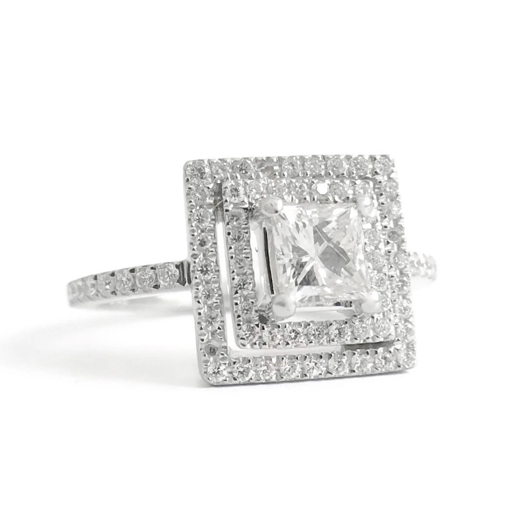 Princess Cut Double Halo Diamond Platinum Engagement Ring 1.07 CTW, 6.85 Grams: Princess Cut Double Halo Diamond Platinum Engagement Ring 1.07 CTW, 6.85 Grams This ring is so beautiful! Please let us know if you have any questions. Diamonds: 1.07 ctw; 1 princess cut .57 ct, I, VS