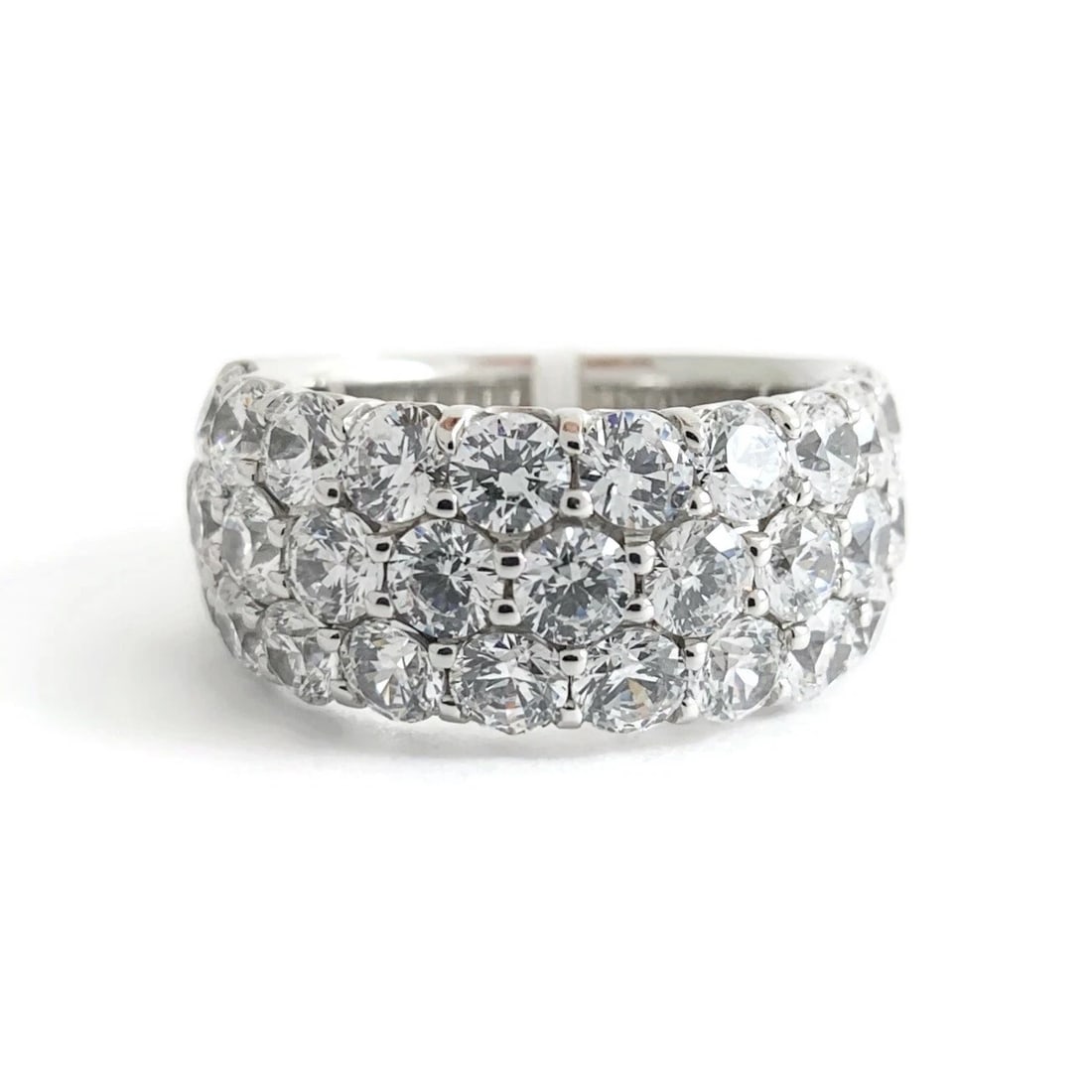 Wide CZ Cubic Zirconia Wedding Band Ring Sterling Silver 4.00 CTW, 9.89 Grams: Wide CZ Cubic Zirconia Wedding Band Ring Sterling Silver 4.00 CTW, 9.90 Grams This is an beautiful ring! Could be worn as statement, wedding or anniversary ring. Gemstones: 31 round cubic zirconia,