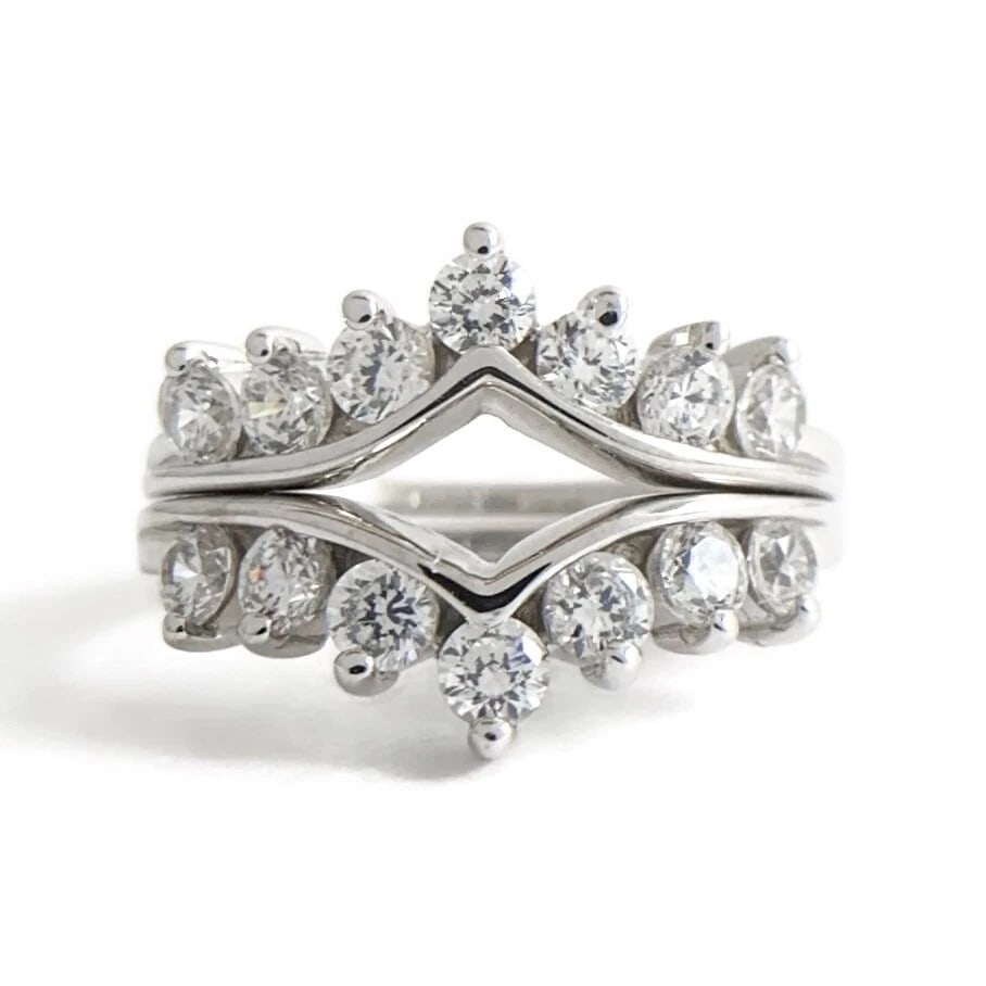 CZ Cubic Zirconia Curved Matching Wedding Band Ring Set 14K White Gold, 3.65 Gr: CZ Cubic Zirconia Curved Matching Wedding Band Ring Set 14K White Gold, 3.65 Gr This is a beautiful ring set! Gemstones: 14 round cubic zirconia, .84 ctw Metal: 14K white gold Weight: 3.65 grams