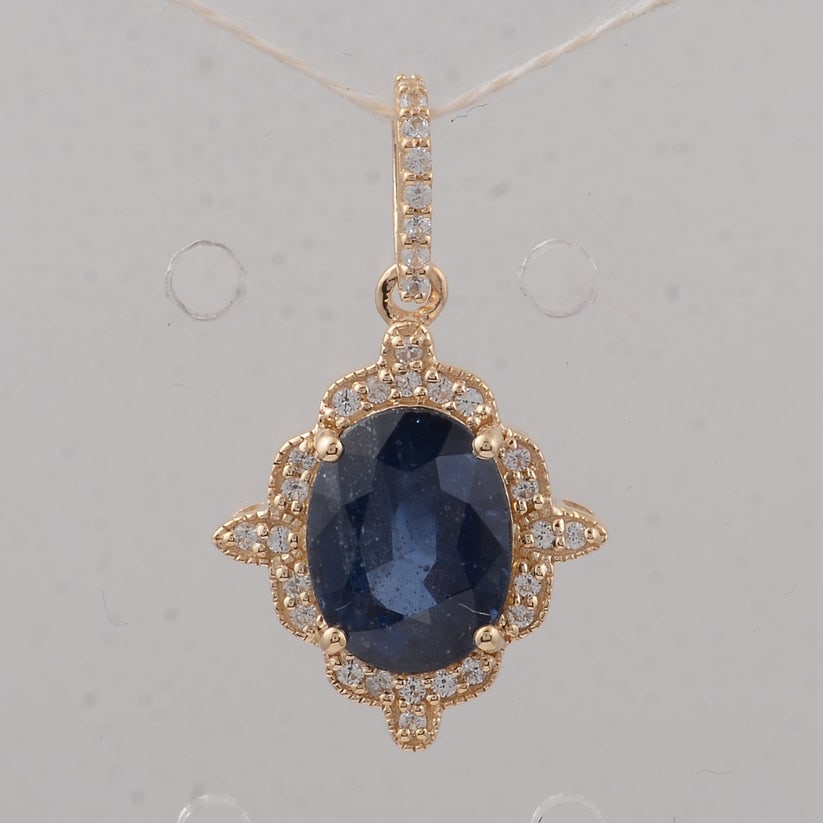 2.48 Ct Oval Sapphire 9K Gold Pendant: 2.48 Total Carat Sapphire 9K Gold Pendant Specifications: Total Weight 1.42 g Center Gemstone Sapphire Gemstone Carat Weight 2.31 Carats Gemstone Measurements 8.80X6.70X4.40 mm Additional Gemstones