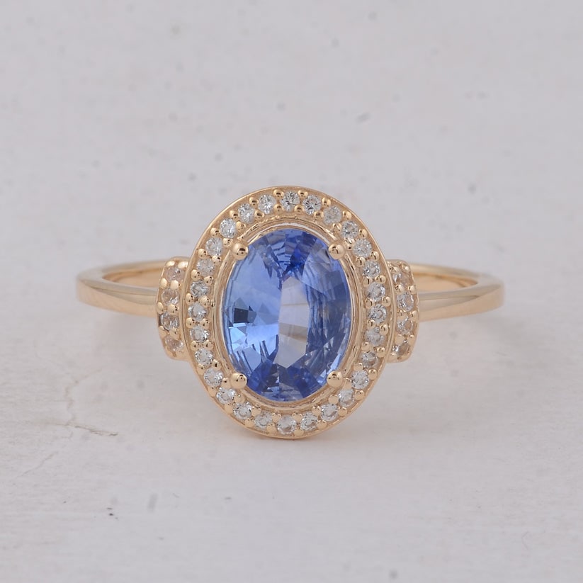 1.13 Ct Oval Sapphire 9K Gold Ring: 1.13 Total Carat Sapphire 9K Gold Ring Specifications: Total Weight 1.926 g Center Gemstone Sapphire Gemstone Carat Weight 0.97 Carats Gemstone Measurements 7.80X5.90X3 mm Additional Gemstones White