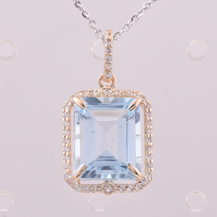 4.41 Ct Octagon Blue Topaz 9K Gold Pendant