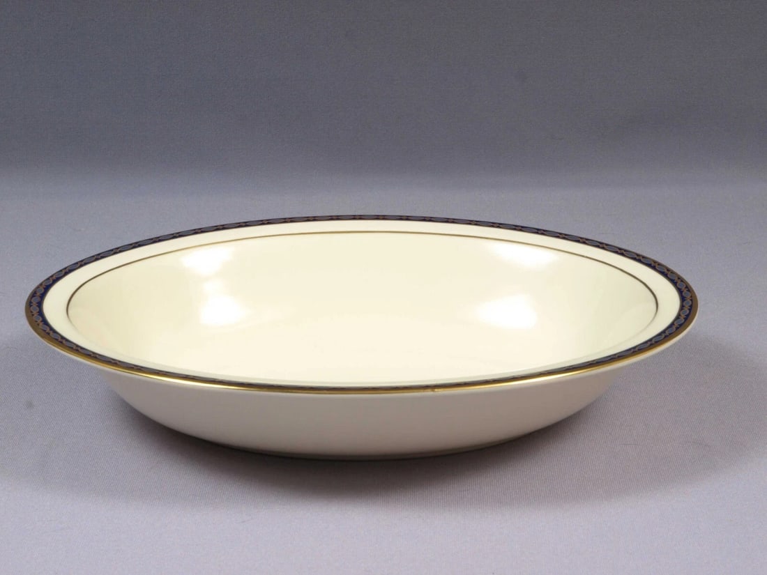 MINTON ST JAMES OVAL Vegetable Fruit Serving BOWL Gold Cobalt England: This is a gorgeous Oval Serving Bowlby Minton - Made in England. The bowl is in the gorgeous St James pattern. It has gold and blue ovals on cobalt band and gold rim on cream background. It is properl