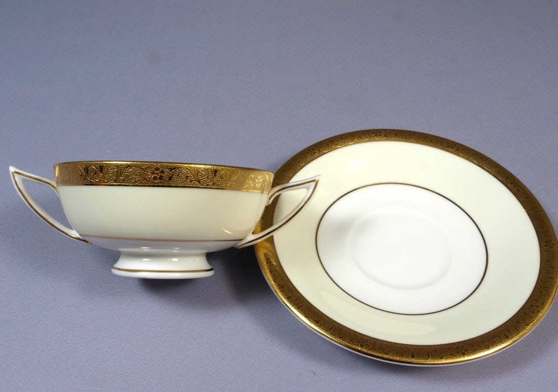 MINTON WESTMINSTER K154 Encrusted Cream Soup Double Handled Bowl Saucer: This is one gorgeous beautiful set of one Cream Soup/Bouillon Bowl with Serving Plate/Saucer by Minton - Made in England. The set is in the gorgeous Westminster pattern. It has gold encrusted band at 