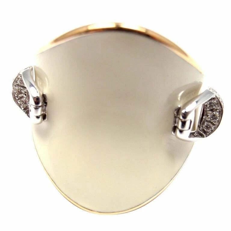Authentic! Roberto Coin Saddle Stirrup 18k Rose Gold Diamond Enamel Ring: Authentic! Roberto Coin Saddle Stirrup 18k Rose Gold Diamond Enamel Ring About This Piece: Metal: 18k Yellow Gold Measurements: Size: 7 Width: 24mm Diamonds: 20 Round brilliant cut diamonds VS1 clarit