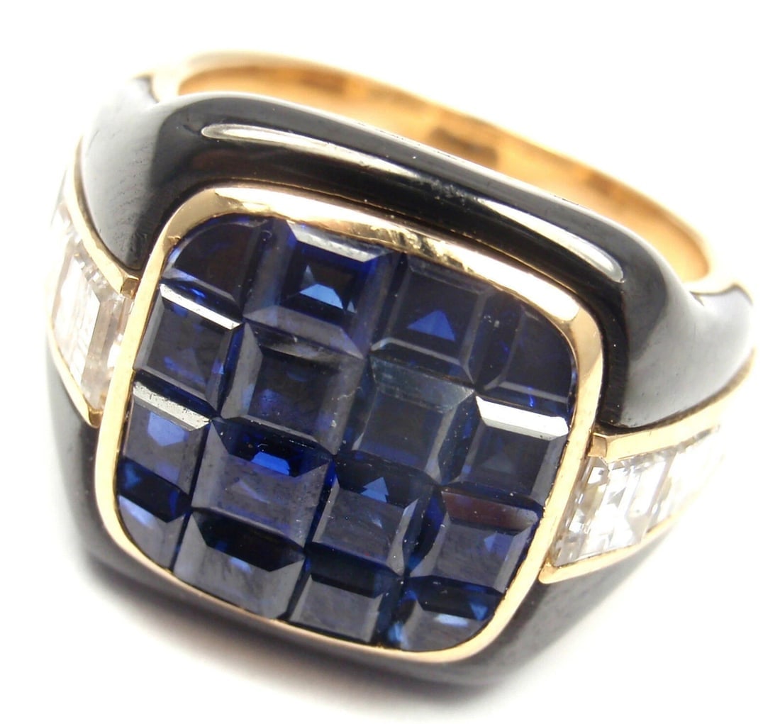 Authentic! Piaget 18k Yellow Gold Diamond Invisible Set Sapphire Enamel Ring: Authentic! Piaget 18k Yellow Gold Diamond Invisible Set Sapphire Enamel Ring About This Piece: Metal: 18k Yellow Gold Size: 6.5 Weight: Width: 16.1 grams 15mm Stones: 8 princess cut diamonds VS1 clari