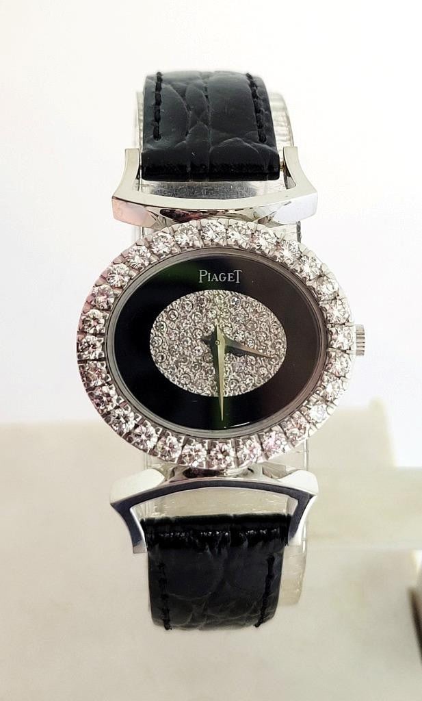 Solid 18k White Gold PIAGET Ladies Dress Watch w/Diamonds Ref 314121* EXLNT: Solid 18k White Gold PIAGET Ladies Dress Watch w/Diamonds Ref 314121* EXLNT ??? This Ladies PIAGET? watch is Swiss made. Great present for yourself or someone you love! * Solid 18k white gold case and
