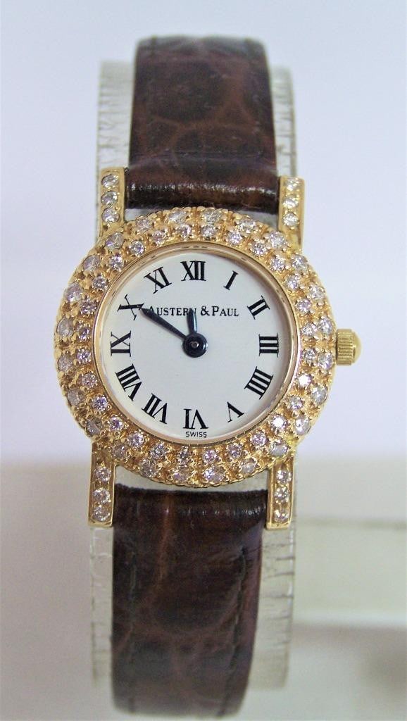 Solid 18k Ladies AUSTERN & PAUL Watch with 1 Ct VS Diamonds* EXLNT: Solid 18k Ladies AUSTERN & PAUL Watch with 1 Ct VS Diamonds* EXLNT???? This Ladies AUSTERN & PAUL?? watch is Swiss made. Great present for yourself or someone you love! * Solid 18k Yellow gold case