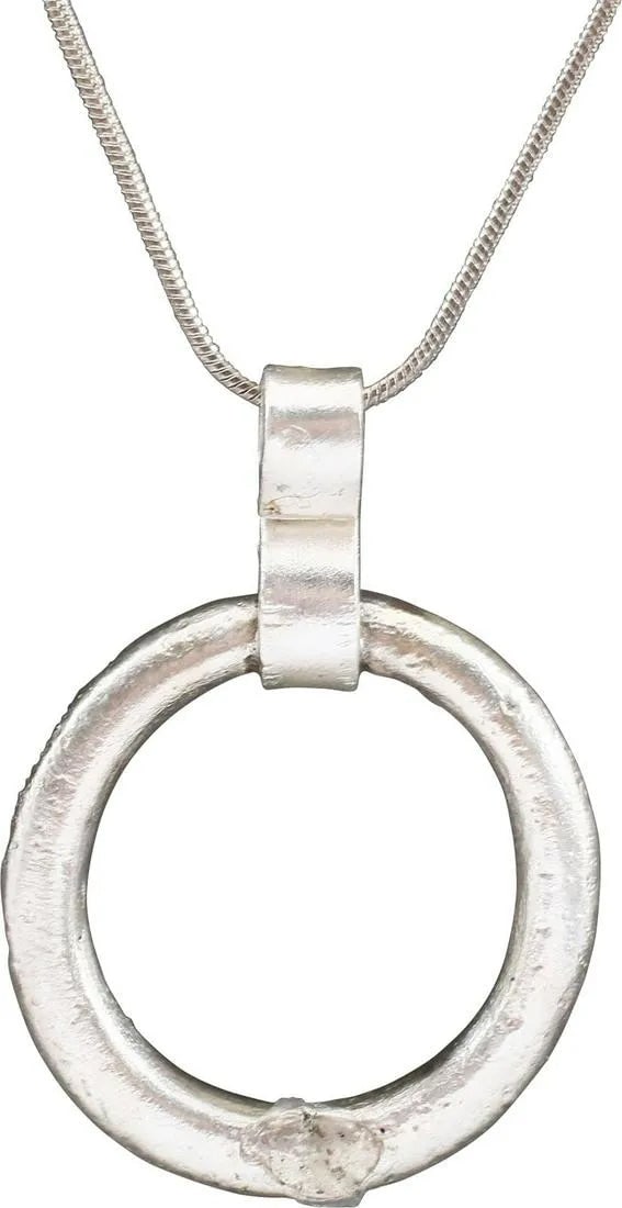 CELTIC PROSPERITY RING NECKLACE C.400-100 BC.: Before the Roman invasion of the British Isles, rings of bronze, silver, and gold were used as a means of exchange, particularly in Ireland. Most exchanges of goods and property were conducted by bart