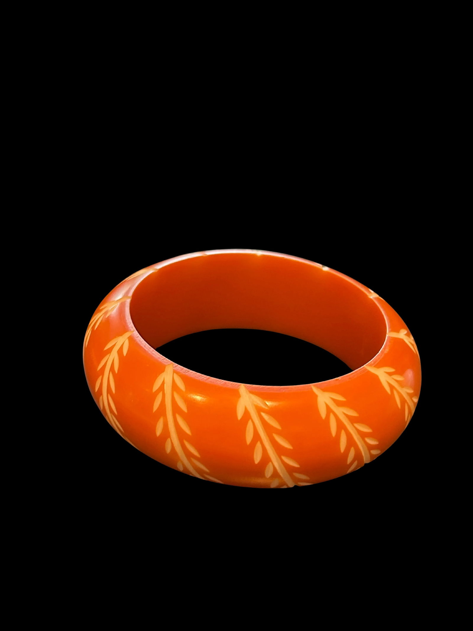 Vintage Bakelite Bangle Bracelet in Chunky Orange With Carved White Floral and Leaf Design, Domed - 3