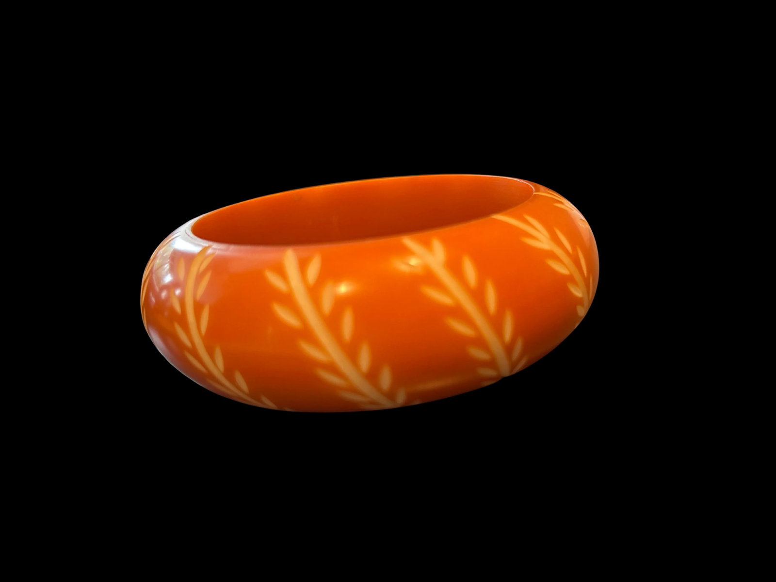 Vintage Bakelite Bangle Bracelet in Chunky Orange With Carved White Floral and Leaf Design, Domed - 5