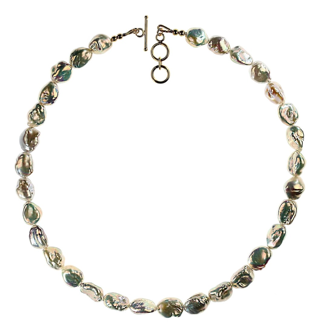 Ajd 19 Inch Iridescent White Chinese Freshwater Pearl Necklace: A 19"‘inch White Chinese Freshwater Pearl necklace like this deserves a description that truly captures its elegance. This piece features second"‘harvest pearls, known for their fuller