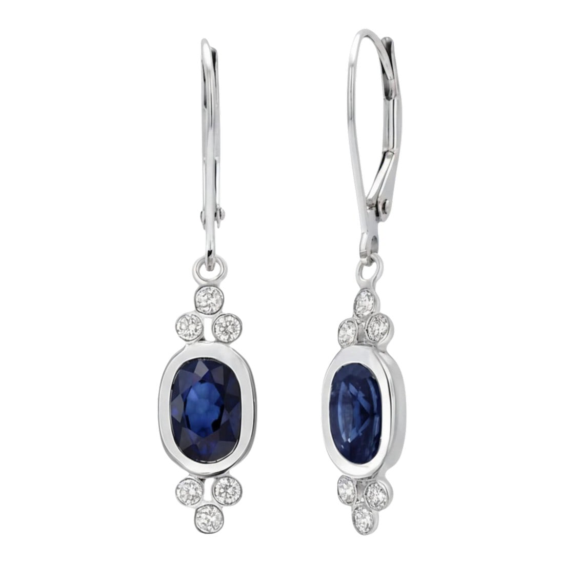 14k White Gold Oval Sapphire and Diamond Drop Earrings With Lever Backs, A Pair: Sleek, sophisticated, and timelessly elegant"”these 14K white gold drop earrings showcase two richly hued oval sapphires measuring 7x5mm and totaling 1.75 carats. Framed by a cascade of 12