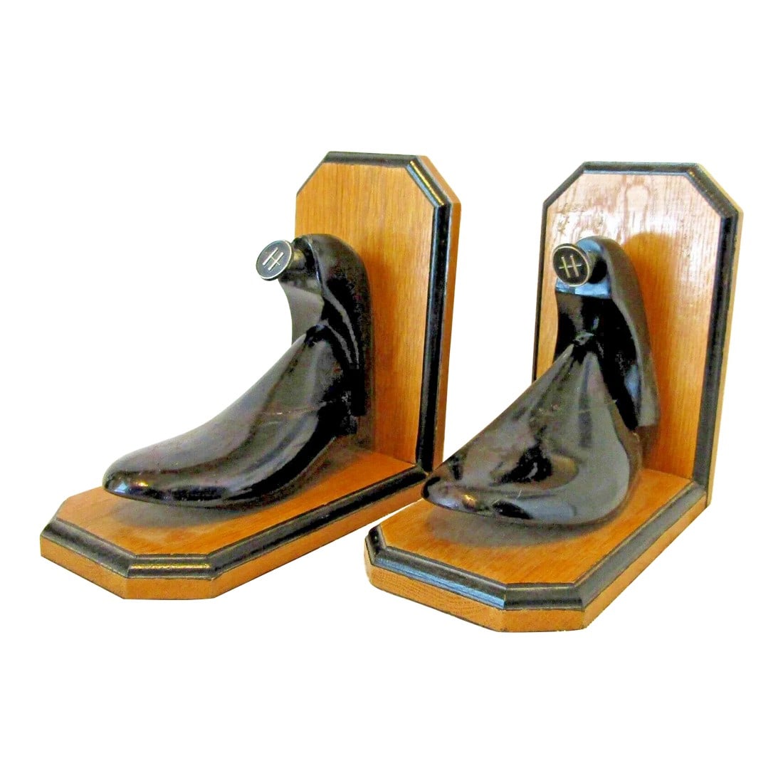 1940s Black Bakelite Cobbler Shoe Form H Bookends - a Pair: Antique Black Bakelite Cobbler Shoe Form H Bookends Each measures 8 1/2" long, 5" wide and 8" tall. Condition: Alterations: Original Condition Unaltered Imperfections: Some Imperfections Condition