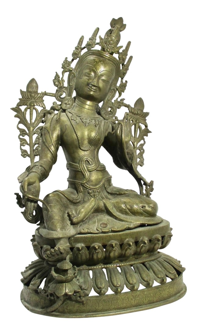 Early 20th Century Antique Nepalese Green Tara Brass Sculpture: Beautiful tara from Nepal at turn of century till about the '30s. Great detail to carving , very stylized Nepalese forms and treatment to lotus and stylized foliage and crown. Condition: Alterations: