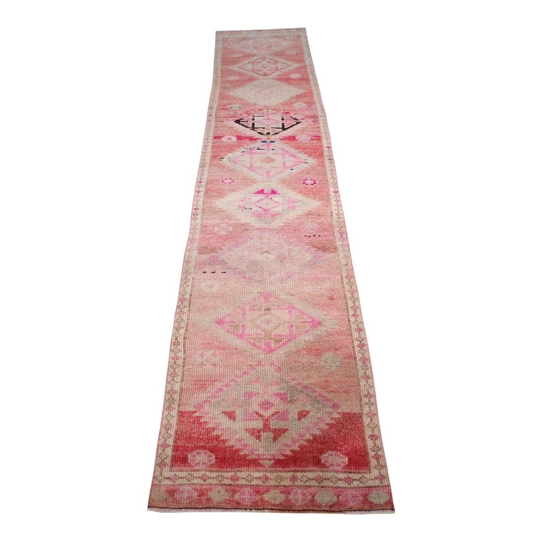 1970s Hand-Knotted Turkish Runner - 2"²2"³ × 10"²7"³: Offered is a Kurdish runner rug, made in Anatolia approximately 40-50 years ago. The beautiful wool on cotton low pile features multicolored rich geometric patterns on a wavy pale red (rose)