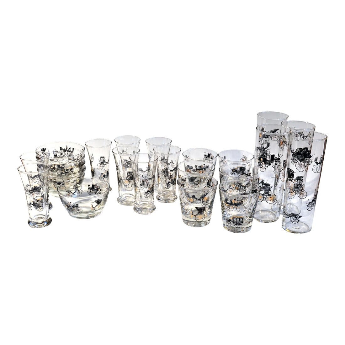 Vintage Libbey Bar Glasses, (23 Pieces) Curio Line Designed by Freda Diamond: Vintage Libbey Bar Glasses, (23 pieces) Curio Line Designed by Freda Diamond, The early 1950s. The charming set of twenty-three pieces of barware each depicts different horse carriages in black with w