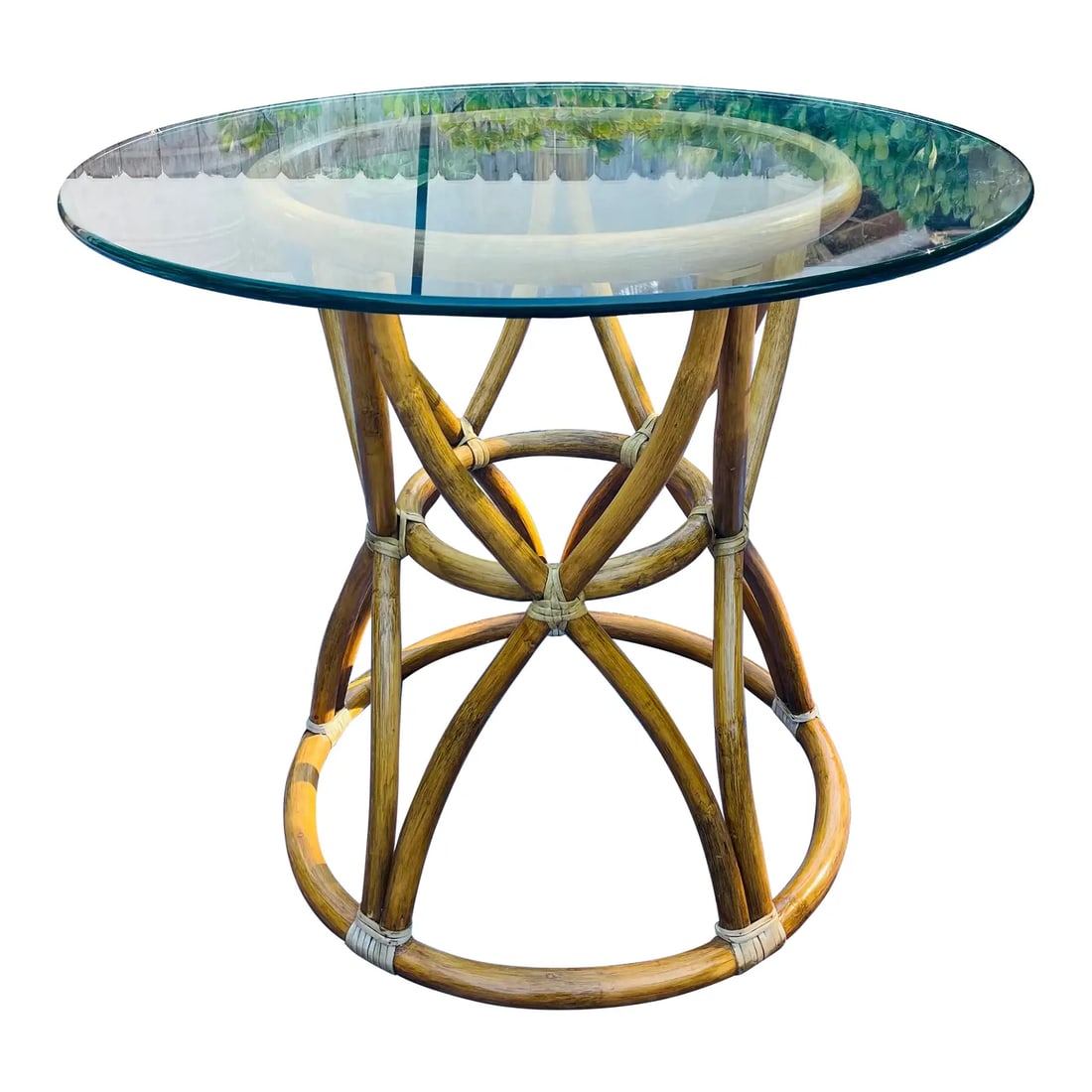 McGuire Vintage Rattan Side Table: Offering an awesome little vintage side table by luxury brand McGuire of San Francisco. Featuring a pedestal style base in a unique bentwood rattan design with leather lashings. Excellent condition