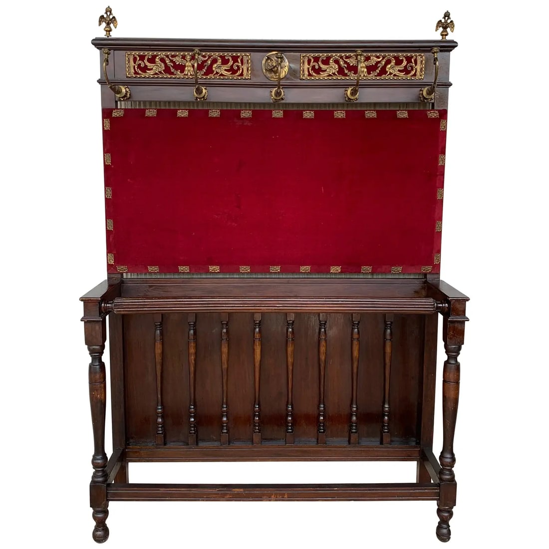 19th Large Carved Spanish Solid Walnut Coat Rack Stand with Red Velvet Back: Large carved Spanish solid walnut coat rack stand has all of the original hardware which is heavy cast iron and has been polished and lacquered for easy maintenance. The top half is profusely carved