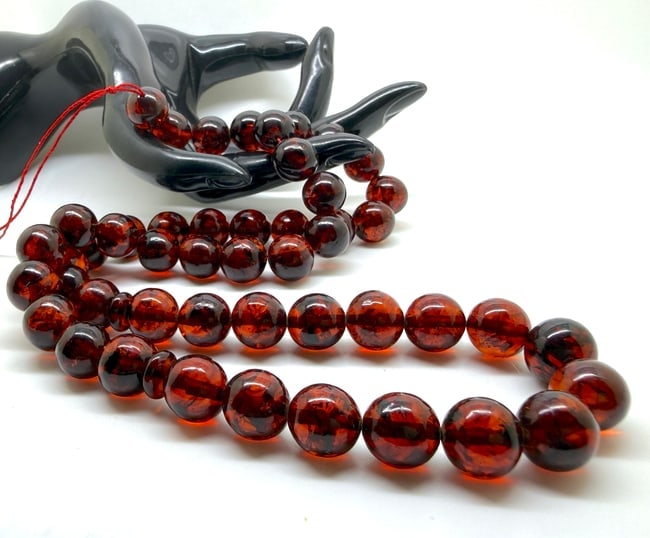 Remarkable Amber Tesbih made from Round Amber beads: Title: Remarkable Amber Tesbih made from Round Amber beadsMetal: NoneGemstone: AmberWeight: 45.0 gSize: Bead size: 12.0 mm Bead size: 0.472 inchesMade of: (Reconstituted Amber or Whole Stone): Reconst