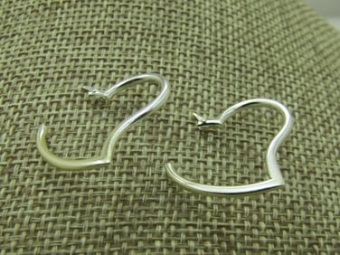 Vintage Sterling Heart Hoop Earrings, Pierced, 1", signed LA: Vintage Sterling Heart Hoop Earrings, Pierced, 1", signed LA, appx. 1.82 grams. 1" tall and wide. Hinged post that locks into the tubular design to complete the heart. Very good condition. (INV. WCOV.