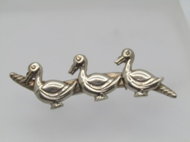Vintage Sterling Three Ducks Brooch, , Mexico. 1940's-1960's: Title: Vintage Sterling Three Ducks Brooch, , Mexico. 1940's-1960'sDescription: Vintage Sterling Three Ducks Brooch, , Mexico. 1940's-1960's, 2-1/8" wide and 3/4" tall. Three ducks following ech other