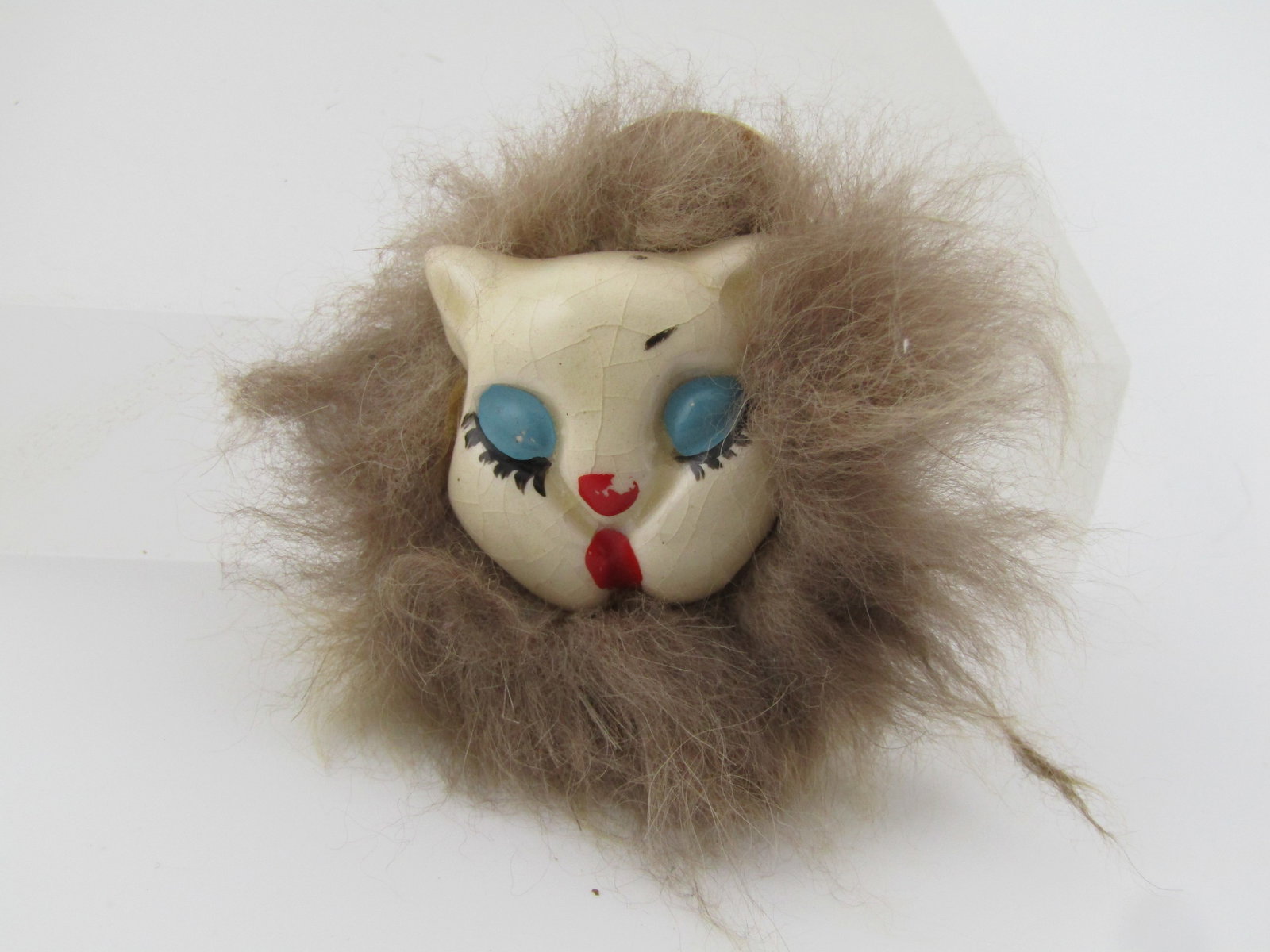 Vintage Ceramic Cat Face/Fur Brooch, Handmade, 1950's-1960's: Vintage Ceramic Cat Face/Fur Brooch, Handmade, 1950's-1960's. This has a painted ceramic cat face that is white glazed with vintage cracking in the glaze and painted over the glaze is blue eye lids, r