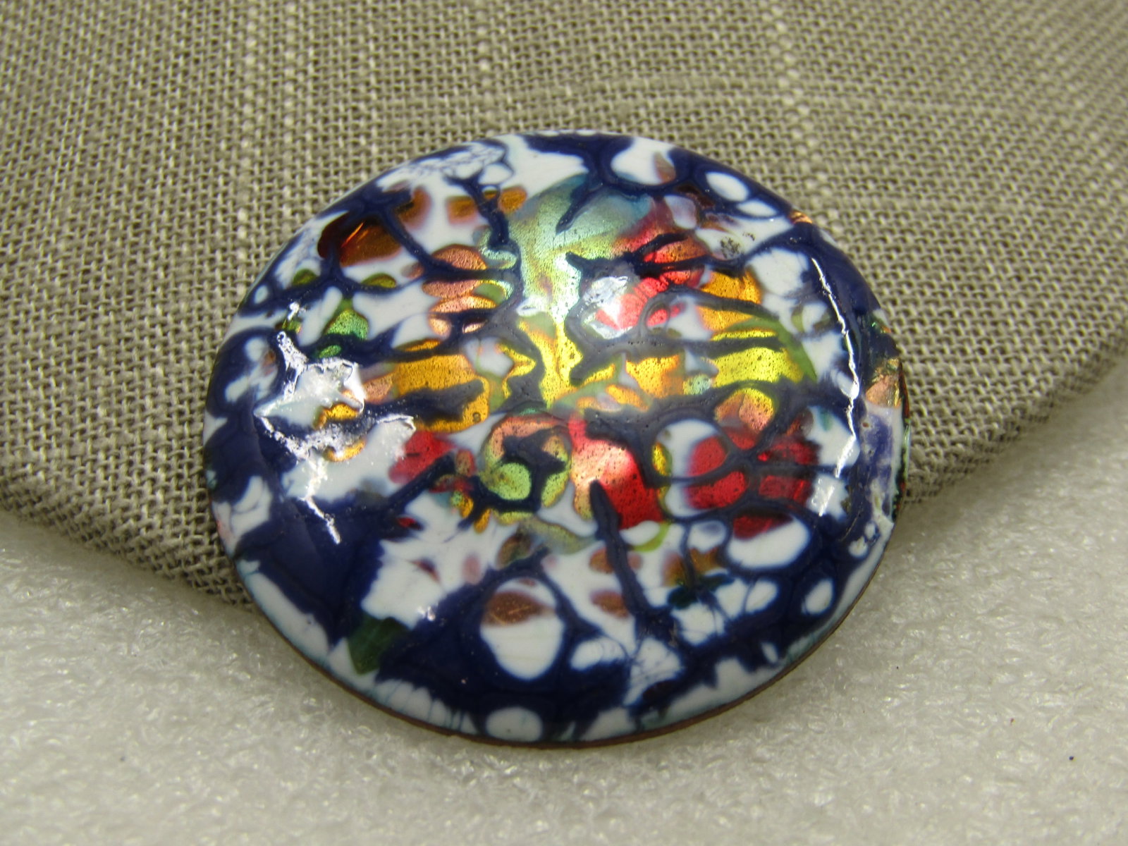 Vintage Enamled Copper Brooch, Colorful Abstract, 1.75": Vintage Enameled Copper Brooch, Colorful Abstract, 1.75" - moddled colors of red, white, green blue, gold and copper enameld over a copper base. Popular in the 1950's through 1970's. This is 1.75"