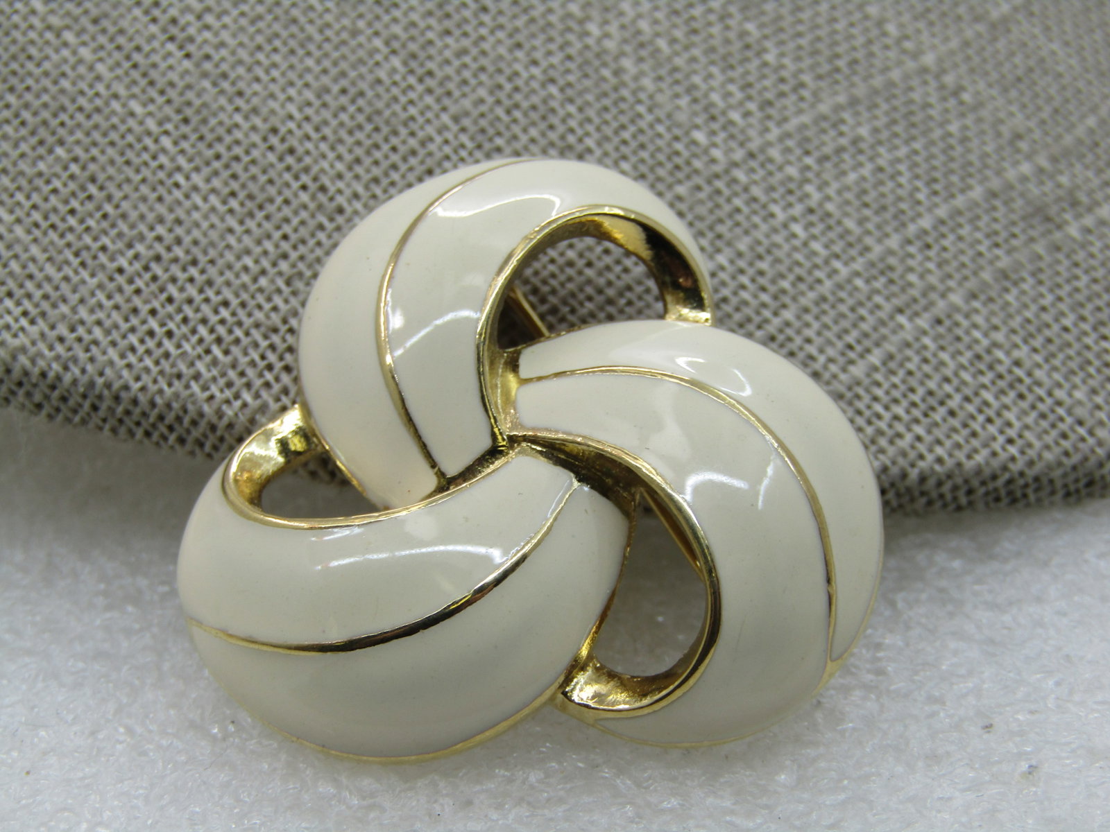 Vintage Faux Pearl Rhinestone Brooch, Aurora Borealis 1960's: Vintage Faux Pearl Rhinestone Brooch, Aurora Borealis 1960's. 2-1/8" wide and 1.5" tall. Faux baroque earls in marquise and round shape with aurora borealis 4.5mm and a single 12mm round aurora