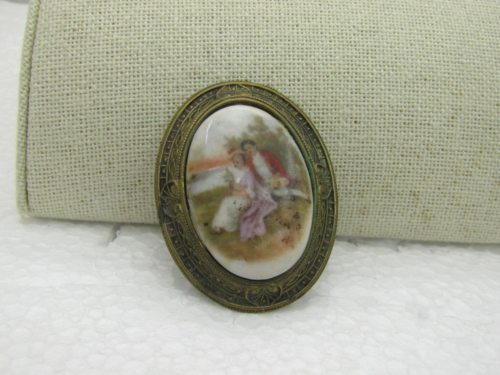 Vintage Courting Scene Cameo Brooch, Framed, Mid-Century, 2" by 1.5": Vintage Courting Scene Cameo Brooch, Framed, Mid-Century, 2" by 1.5", brassy frame with scrolled design tapered upward and providing a bezel-setting around the courting scene - transfer on to what