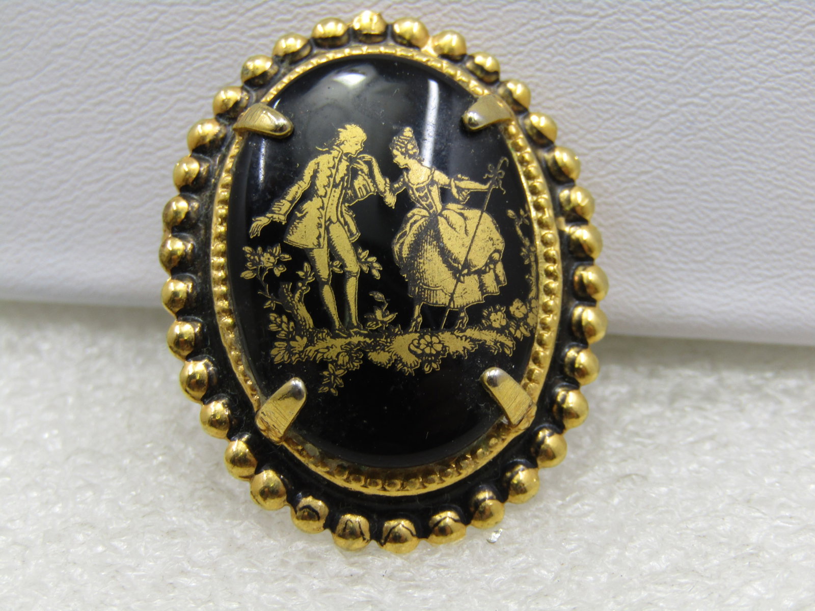 Vintage Black & Gold Courting Cameo Brooch Pendant,: Vintage Black & Gold Courting Cameo Brooch Pendant, 1.25" tall, 1" wide. French type courting scene. There are others with this same image that are signed Florenza - this is not signed. It has a