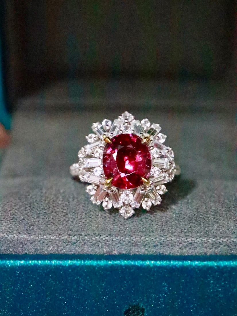 18K Gold Natural Ruby Ring: Title: 18K Gold Natural Ruby Ring Description: This natural ruby ring showcases a rich golden hue and cool white brilliance. The nearly flawless, perfectly round main stone is complemented by
