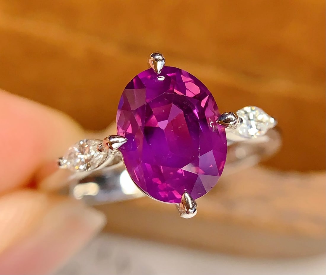 PT950 Natural Fancy Blue Sapphire Ring: Title: PT950 Natural Fancy Blue Sapphire Ring Description: This ring, crafted from PT950 platinum, features a natural blue sapphire, showcasing a rich golden and cool white luster. The large diameter