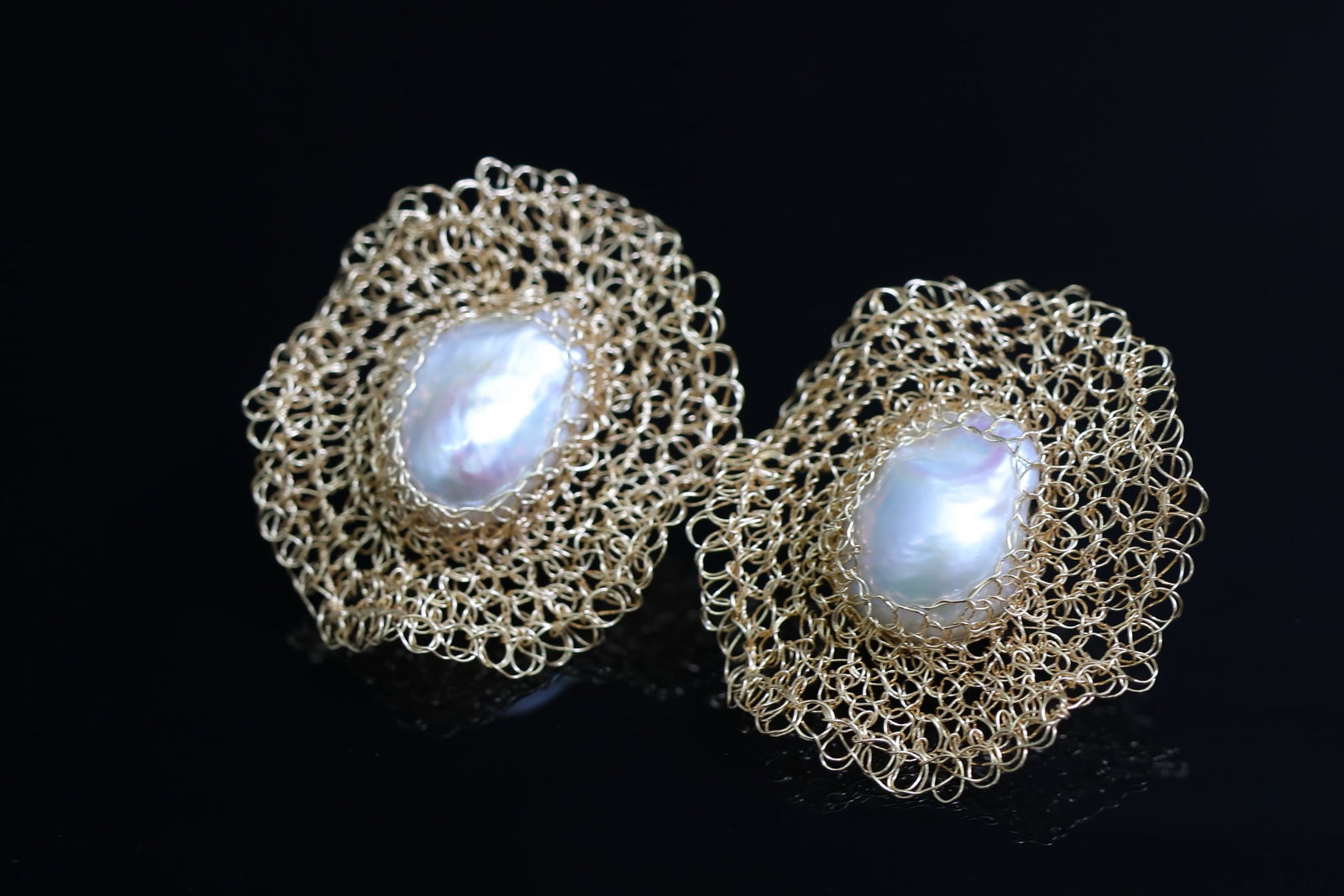 Natural Baroque Pearl Earrings: Title: Natural Baroque Pearl Earrings Description: These earrings feature natural baroque pearls. The rich gold and cool white tones complement each other perfectly, highlighting the pearls' luster