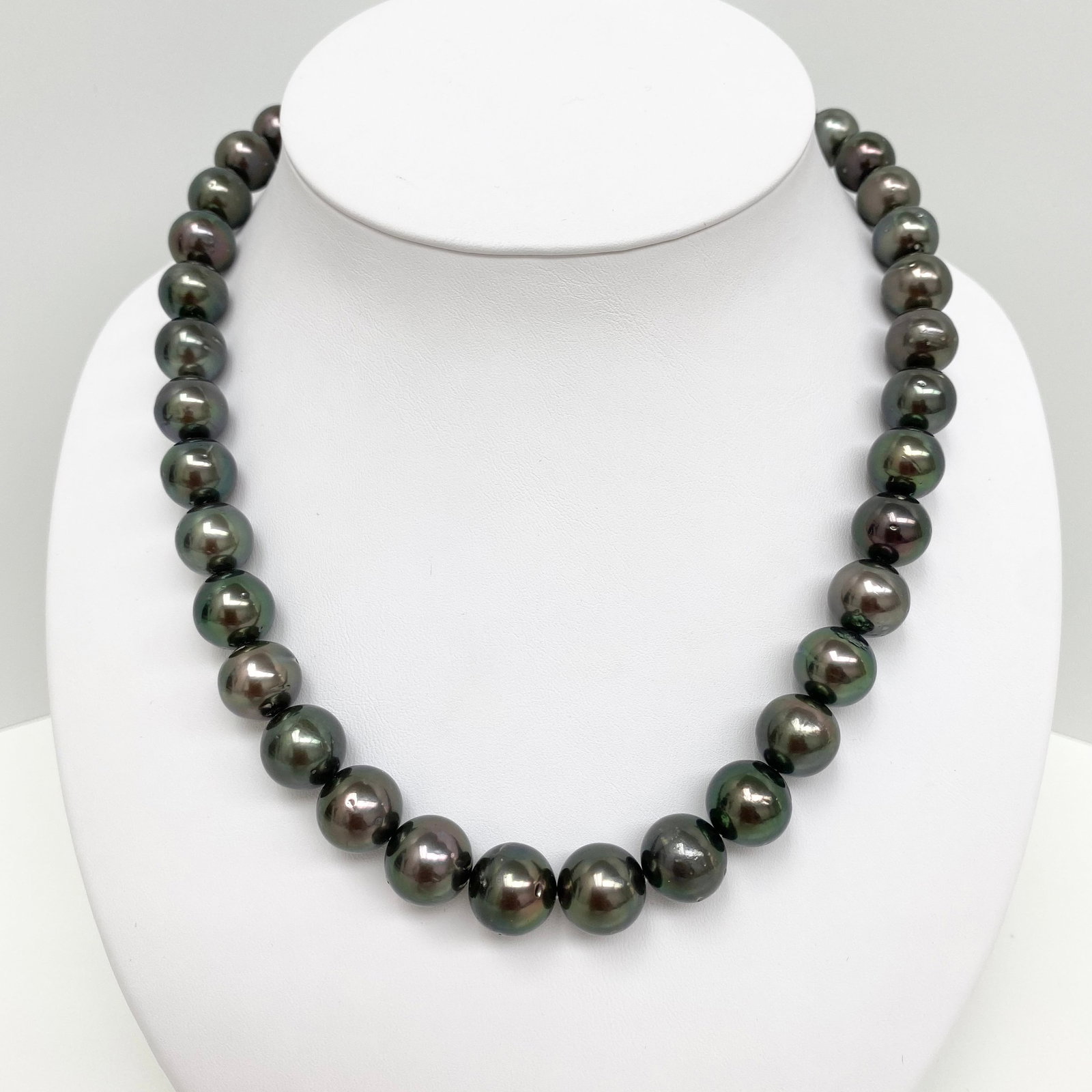 11-13mm Tahitian Dark Green Round/Near-Round Pearl Necklace with 14k Clasp: Title:11-13mm Tahitian Dark Green Round/Near-Round Pearl Necklace with 14k Clasp Description:AAA Luster, Tahitian Dark Green Round/Near-Round Pearl Necklace, 35 pearl pieces, 18 inches hand-knotted