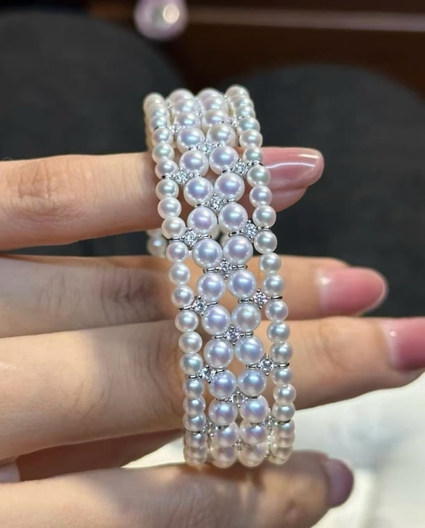 Sterling Silver Aurora Pearl Bracelet: Title: Sterling Silver Aurora Pearl Bracelet Description: This bracelet features a vintage multi-row design with 3-4mm and 5-6mm aurora pearls, nearly perfectly round and high-quality, showcasing natu