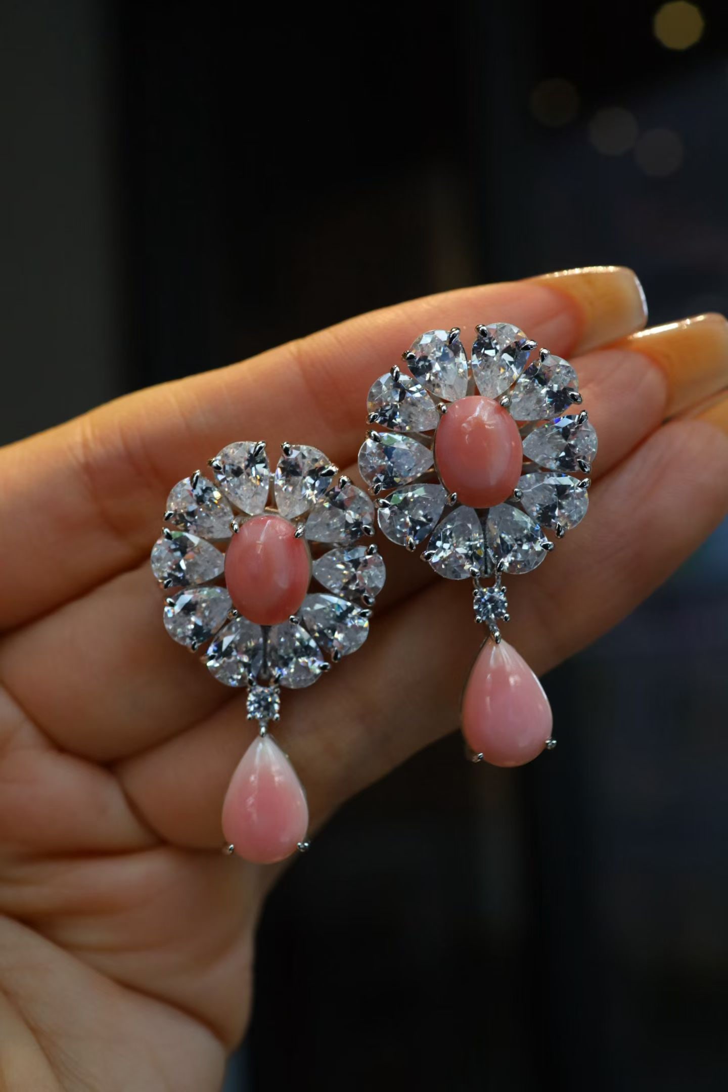 Sterling Silver Blush Conch Earrings: Title: Sterling Silver Blush Conch Earrings Description: Sterling Silver Blush Conch Earrings, this necklace resembles the gentle hues of spring. Crafted in sterling silver with exquisite zircon
